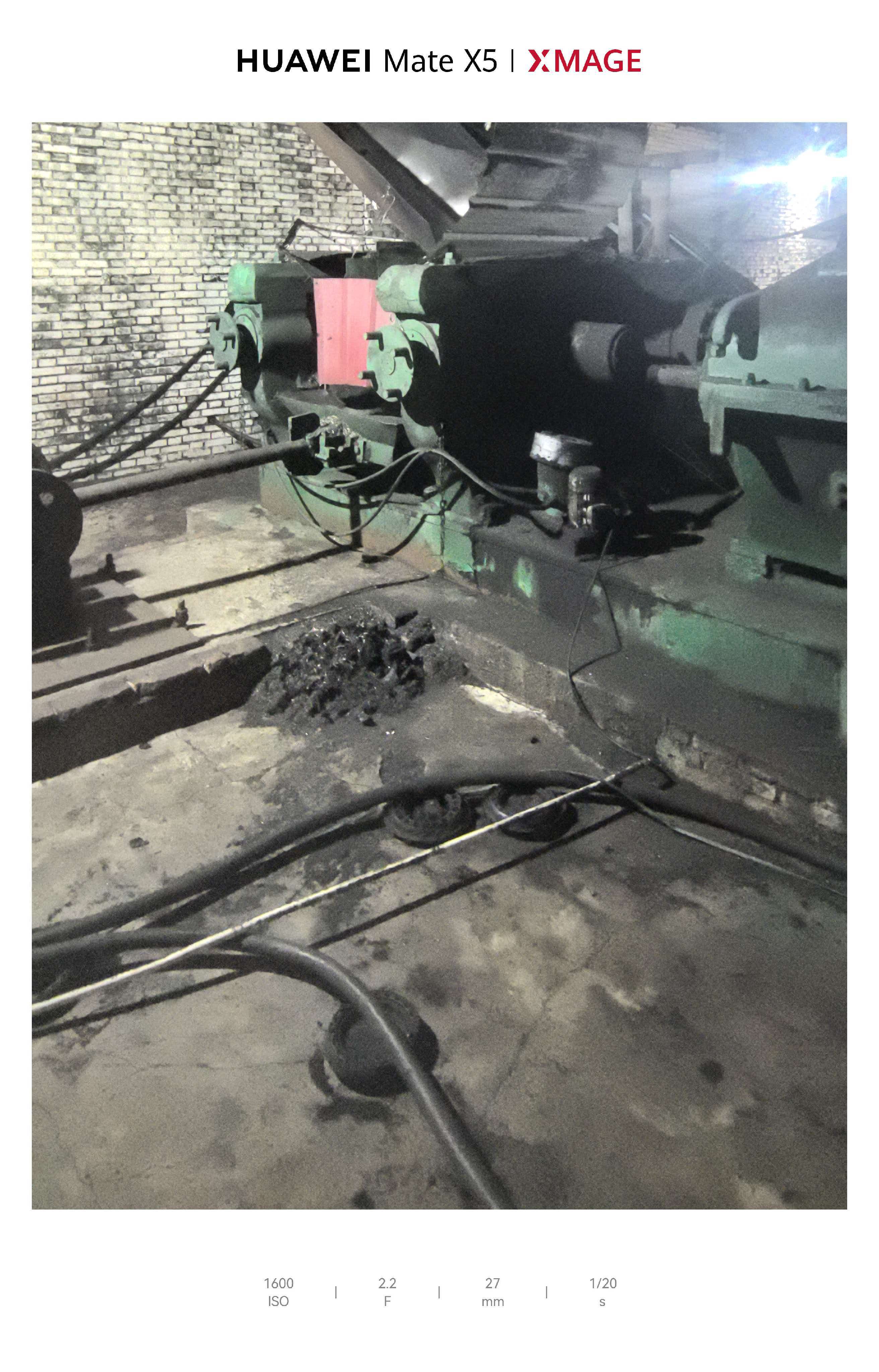 Crushing machine reducing tyre rubber into fine granules inside the workshop